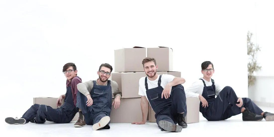 The clearance team with moving boxes